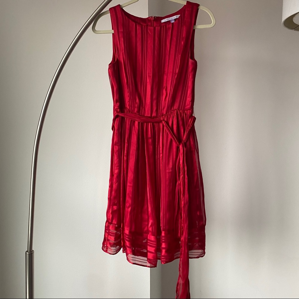 Red holiday dress with red stripes and sash